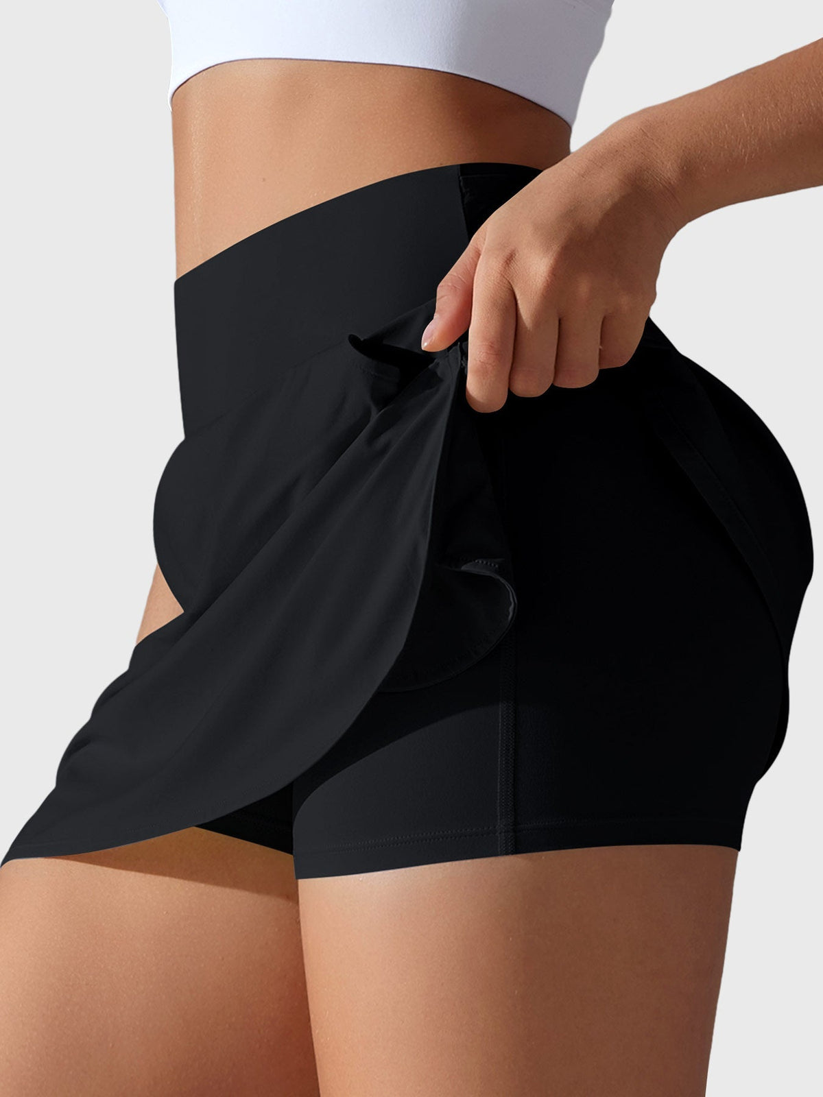 Falda de tenis FORME Ease de tiro alto